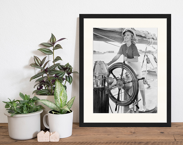 Liv Corday Woman Steering Boat