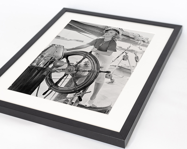 Liv Corday Woman Steering Boat