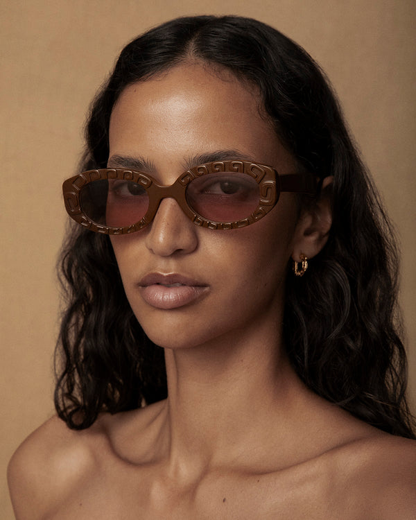 Lucy Folk Draa Embossed Oval Sunglasses