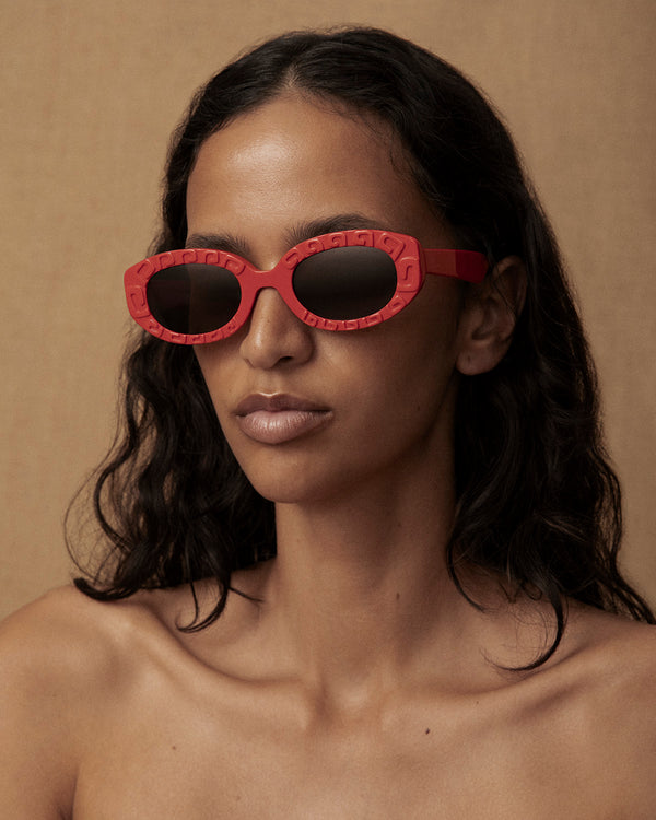 lucy folk Draa Embossed Oval Sunglasses