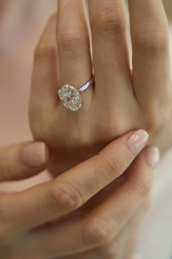 LuvMyJewelry Evania 14K White Gold Oval Cathedral Lab Grown Diamond Hidden Halo Engagement Ring - 5.15 Cts