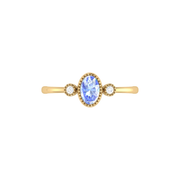 LuvMyJewelry Oval Cut Tanzanite & Diamond Birthstone Ring In 14K Yellow Gold