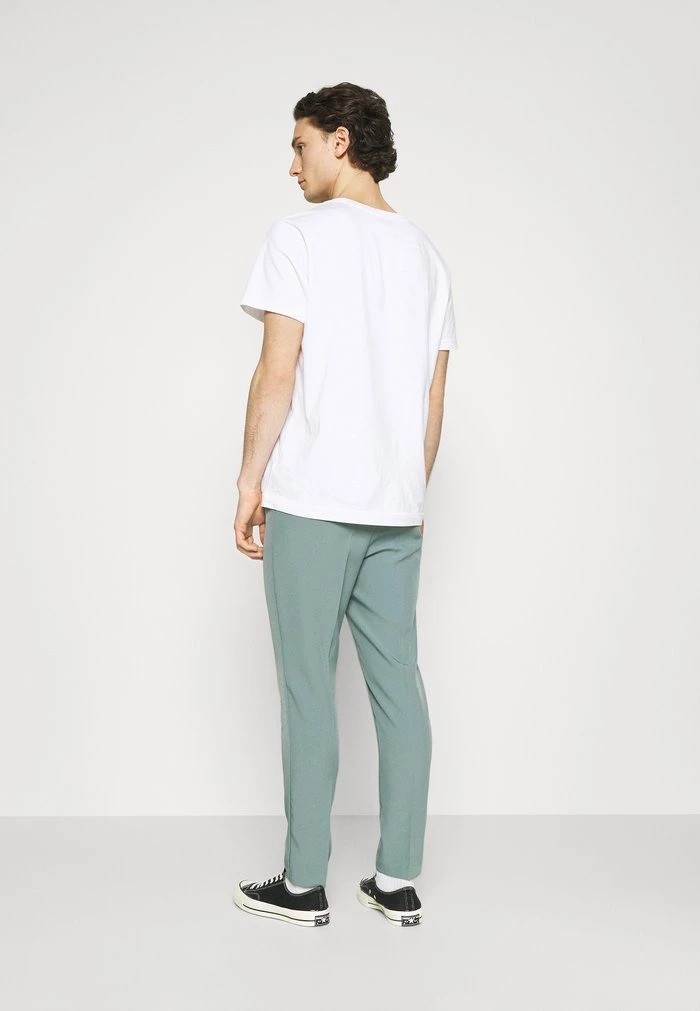 Mennace Mennace AFTERMATH TAPERED SUIT TROUSER – Trousers – Light Blue