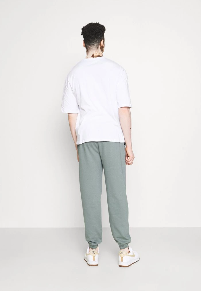 Mennace MENNACE ESSENTIAL REGULAR UNISEX – Tracksuit Bottoms – Teal