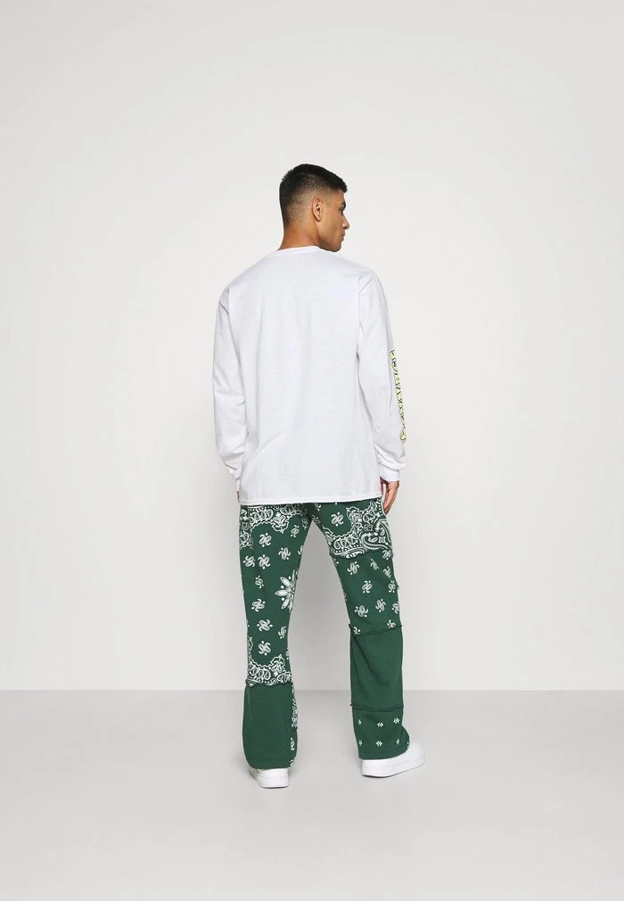 Mennace Mennace MESUNDAZE BUTTERFLY – Long Sleeved Top – White