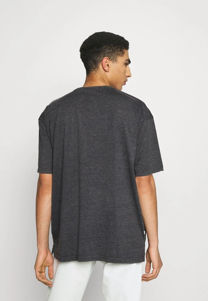 Mennace Mennace RECLAIM OVERSIZED POCKET TEE UNISEX – Basic T-shirt – Washed Black
