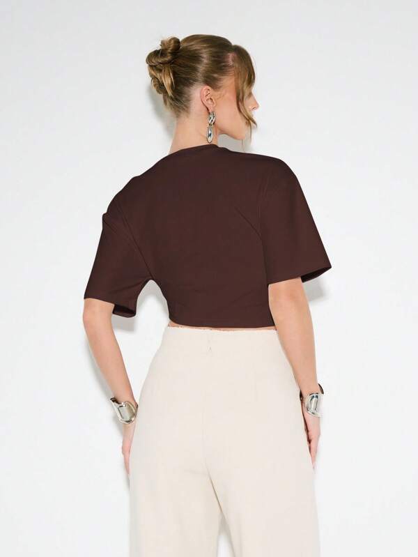 Missguided KIZN Cutout Crop T Shirt Metal Ring Detail Oversized Sleeves Summer Statement Top Festival Fashion Aesthetic Waist Cut Out Casual Modern Design