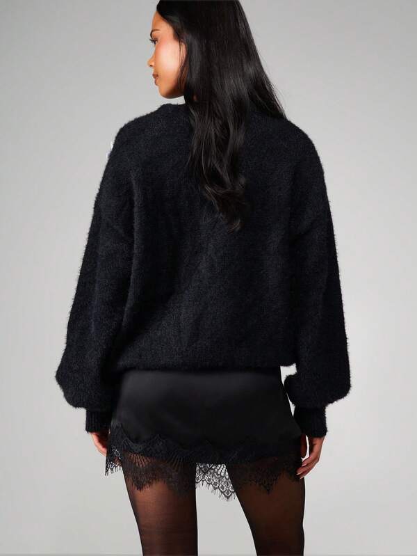 Missguided MISSGUIDED Christmas Oversized Fuzzy Knit Sweater With Bow Pattern