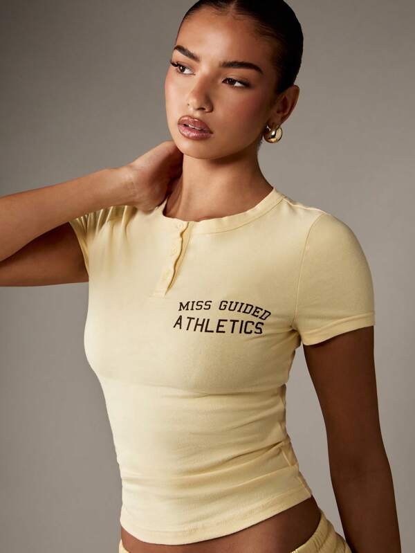 missguided MISSGUIDED Cropped Baby T Shirt With Button Front And Varsity Text