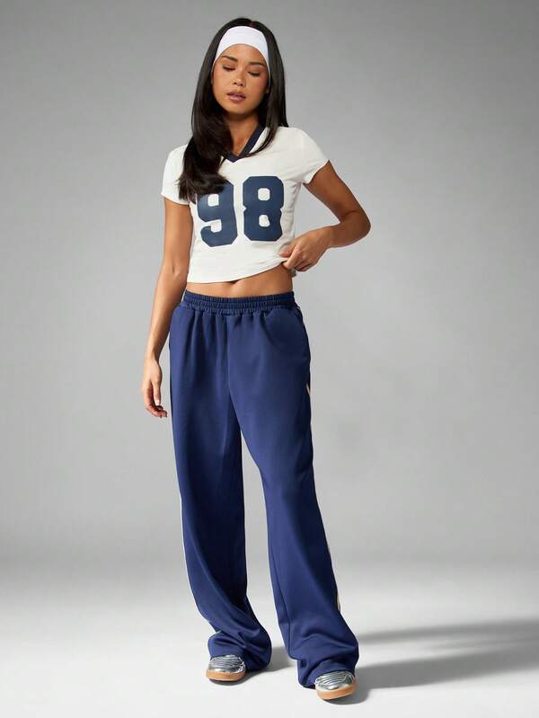 Missguided MISSGUIDED Cropped V Neck Baby Tee With Varsity Number