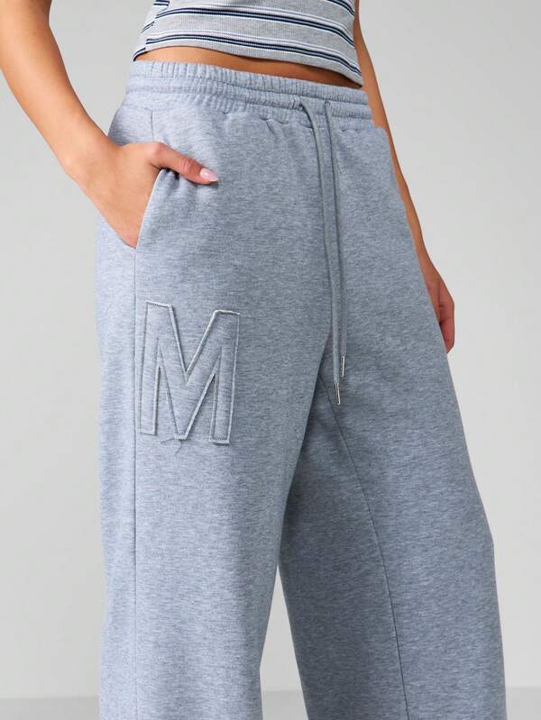 Missguided MISSGUIDED High Rise Wide Leg Joggers With Embossed Logo
