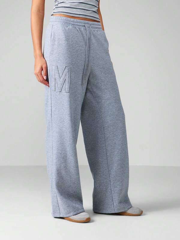 missguided MISSGUIDED High Rise Wide Leg Joggers With Embossed Logo