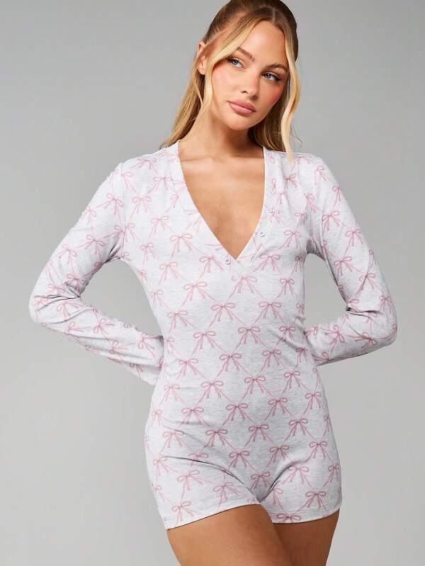 missguided MISSGUIDED Bow Print Long Sleeve Romper