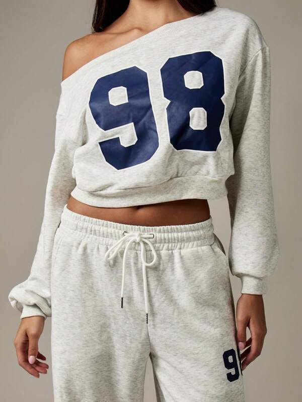 Missguided MISSGUIDED Off Shoulder Cropped Varsity Sweatshirt With Numeric Print