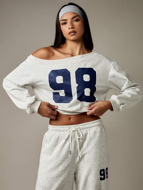 missguided MISSGUIDED Off Shoulder Cropped Varsity Sweatshirt With Numeric Print
