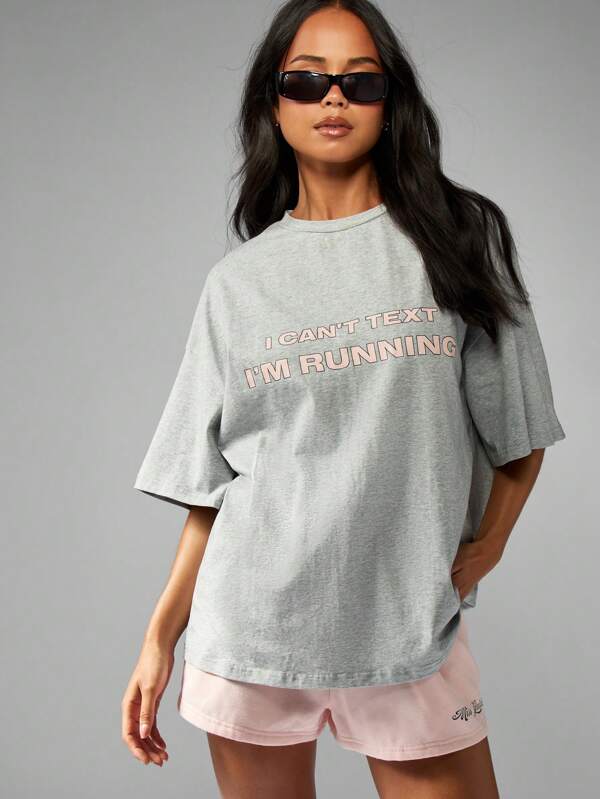 missguided MISSGUIDED Oversized Graphic T Shirt With Running Message Print