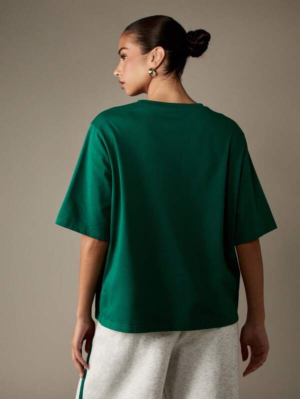 Missguided MISSGUIDED Oversized T Shirt With Retro Track Text Print