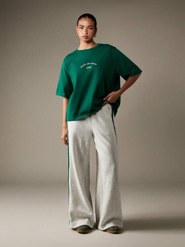 Missguided MISSGUIDED Oversized T Shirt With Retro Track Text Print