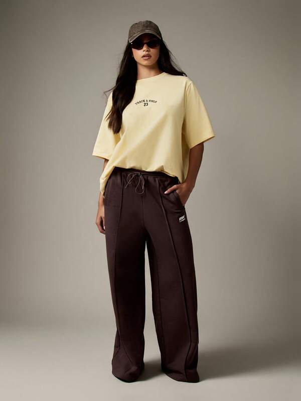 Missguided MISSGUIDED Oversized Track Field T Shirt With Varsity Number Design