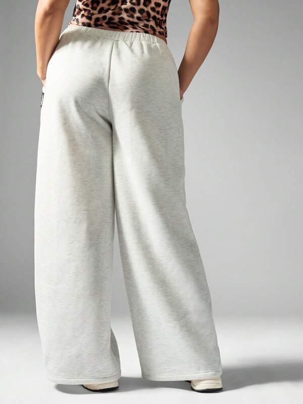 Missguided MISSGUIDED PLUS X Playboy Comfort Plus Size Jogger Sweatpants With Logo Print