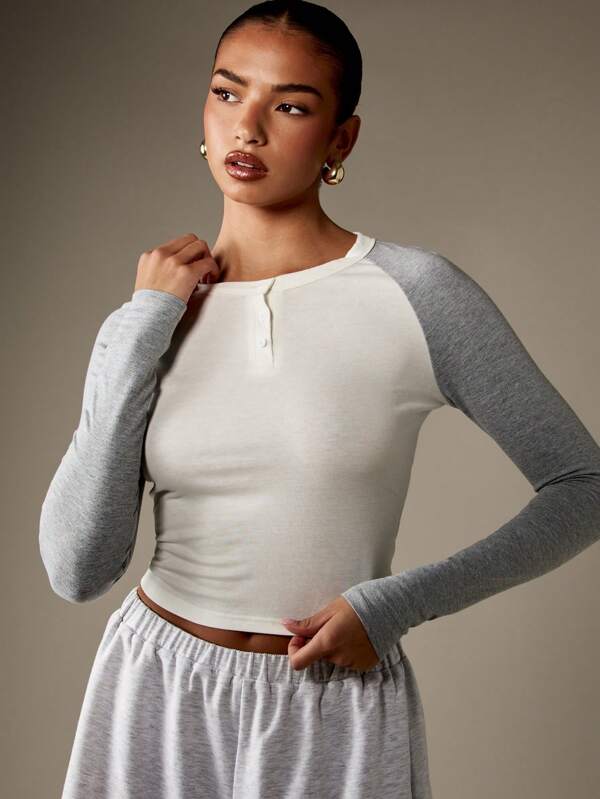 missguided MISSGUIDED Raglan Sleeve Henley Crop Top With Slim Fit