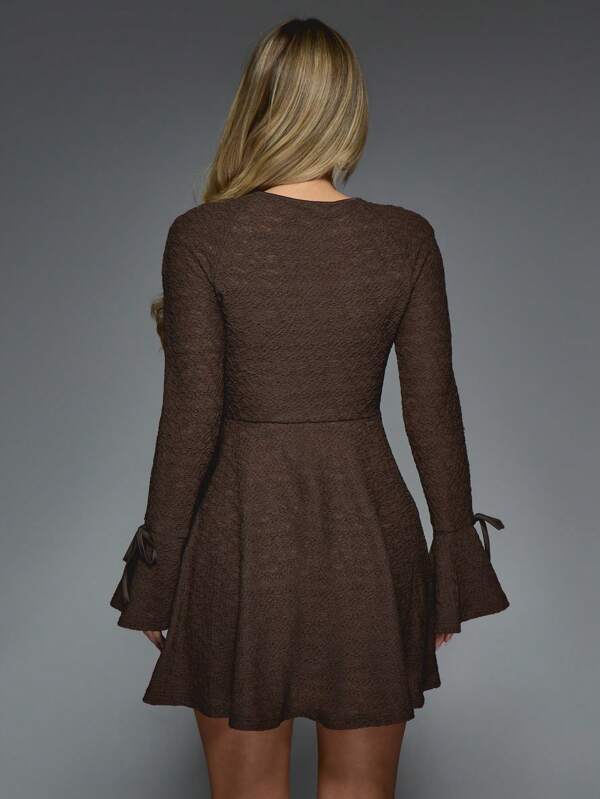 Missguided MISSGUIDED Textured Long Bell Sleeves With Bow Detail Mini Dress