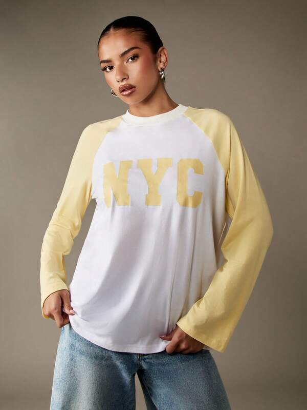 Missguided MISSGUIDED Varsity NYC Graphic Long Sleeve Raglan T-Shirt With Crewneck