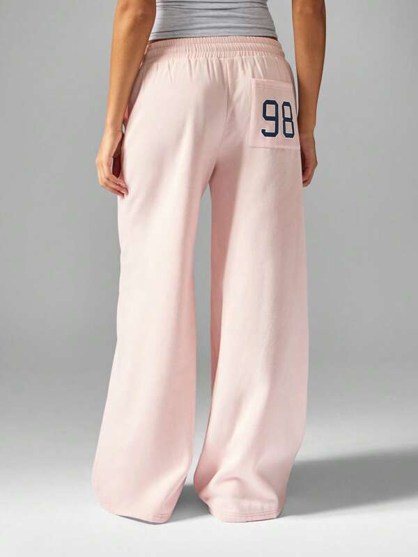 Missguided MISSGUIDED Wide Leg Jogger Pants With Drawstring And Number Print