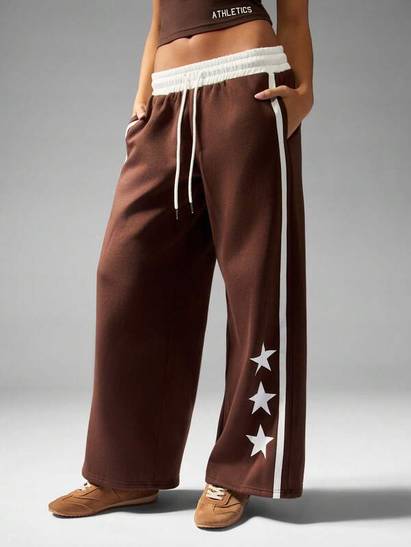 missguided MISSGUIDED Wide Leg Joggers With Star Print And Contrast Stripes