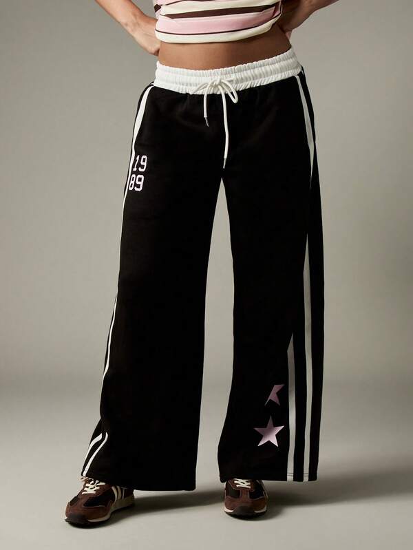 missguided MISSGUIDED Wide Leg Track Pants With Star Patches And Side Stripes