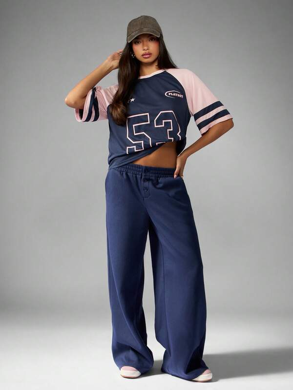 Missguided Missguided X Playboy Baseball Style Raglan T-Shirt With Number Print