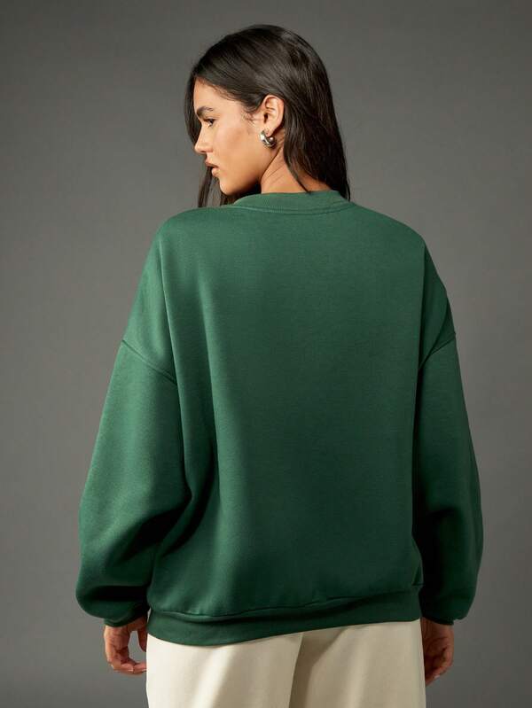 Missguided Missguided X Playboy Classic Crew Neck Sweatshirt With City Statement Design