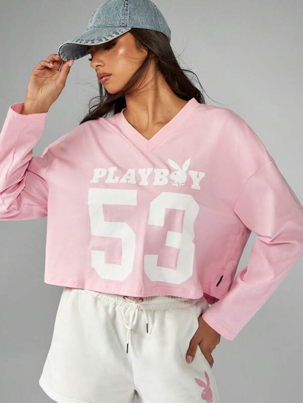missguided Missguided x Playboy Cropped V Neck Long Sleeve T Shirt With Varsity Number