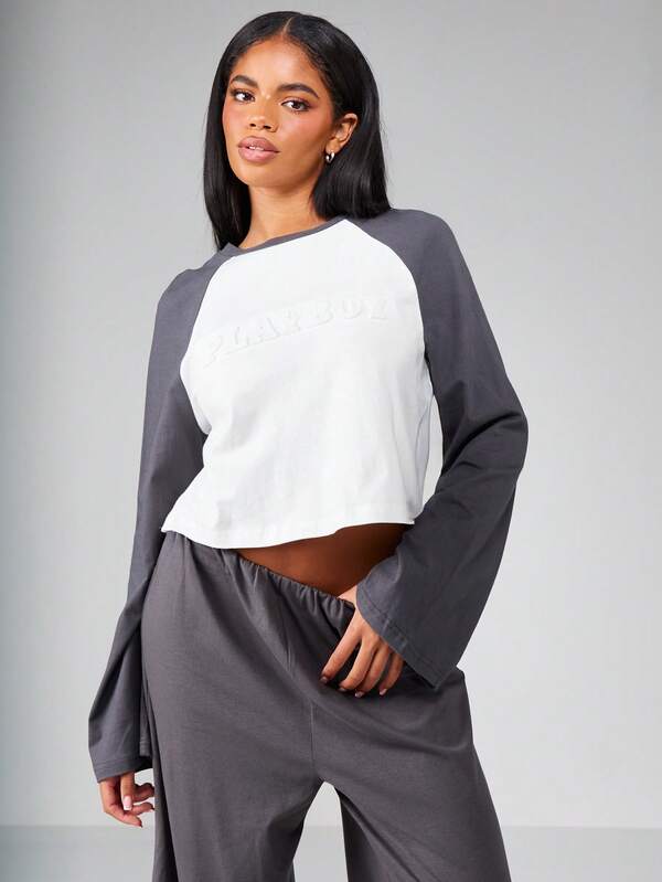 missguided Missguided x Playboy Embossed Design Raglan Long Sleeve Cropped Top