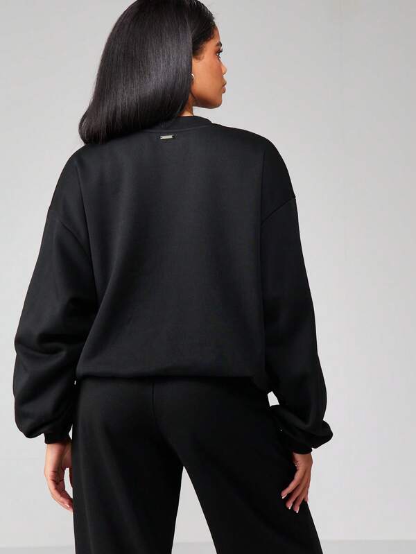 Missguided Missguided X Playboy Embossed Logo Crewneck Sweatshirt With Ribbed Trim