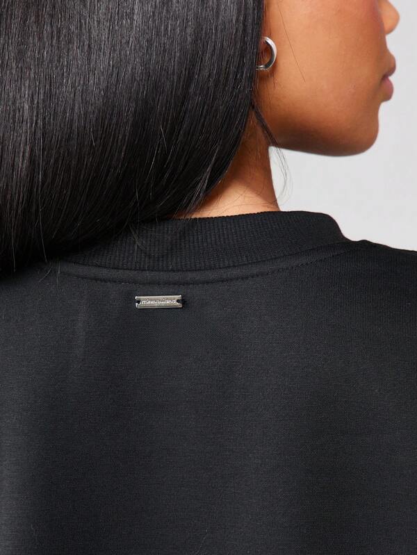 Missguided Missguided X Playboy Embossed Logo Crewneck Sweatshirt With Ribbed Trim