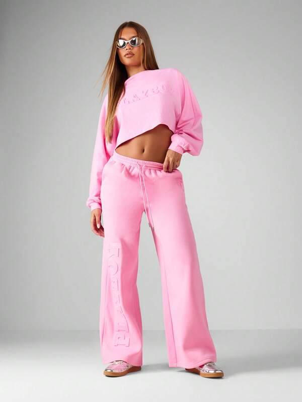 missguided Missguided x Playboy Embossed Logo Wide Leg Pants With Cropped Sweatshirt Set