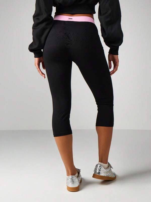 missguided Missguided x Playboy Embossed Script Capri Leggings With Pink Waistband