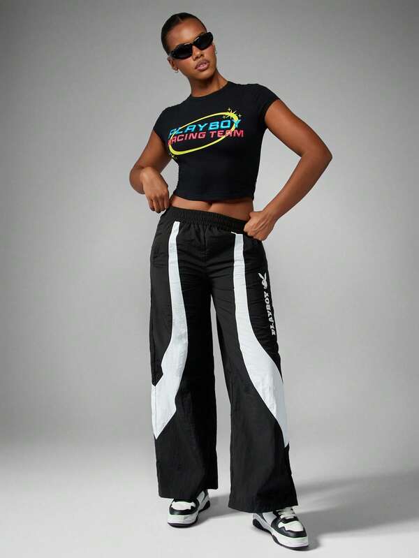 Missguided Missguided X Playboy Fitted Crop Baby Tee With Racing Team Graphics