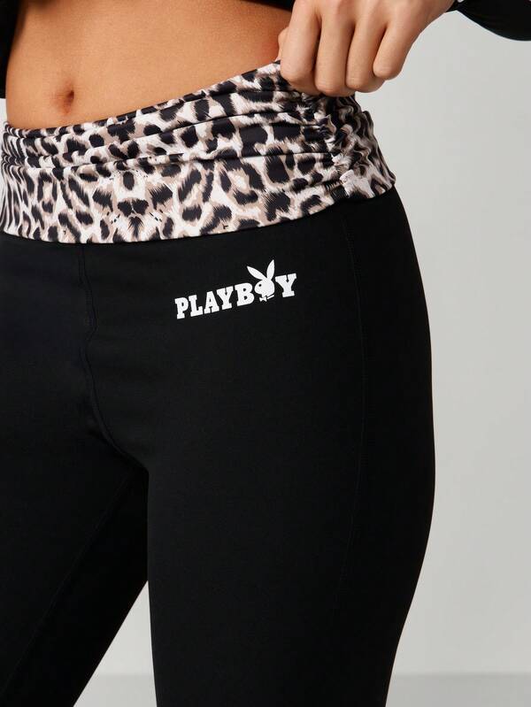 Missguided Missguided X Playboy Flared Yoga Pants With Leopard Print Detail
