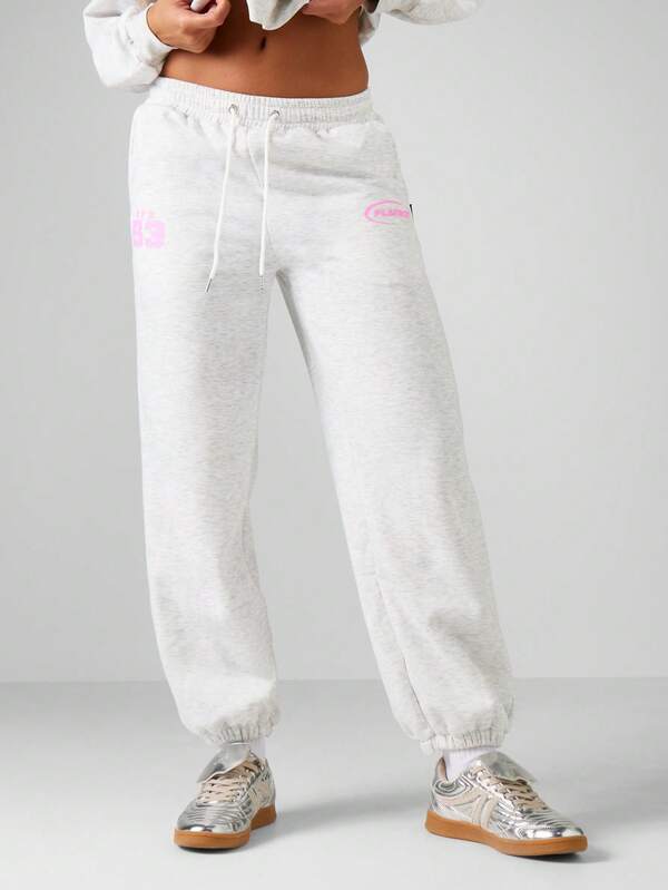 Missguided Missguided X Playboy Heathered Graphic Cuffed Joggers With Motorsports Print