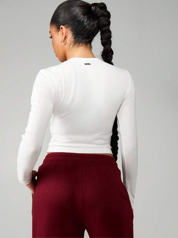 Missguided Missguided X Playboy Long Sleeve Embossed Crew Neck Top