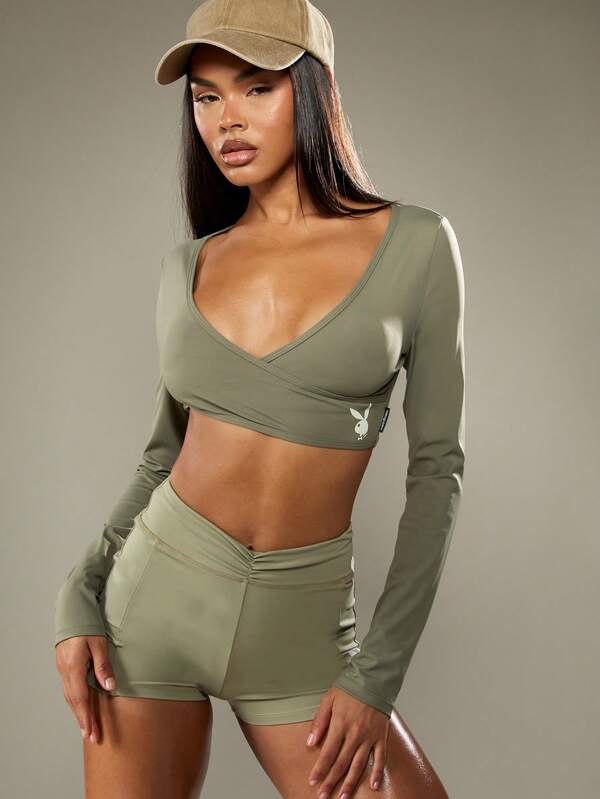 Missguided Missguided X Playboy Long Sleeve Wrap Front Crop Top With Logo
