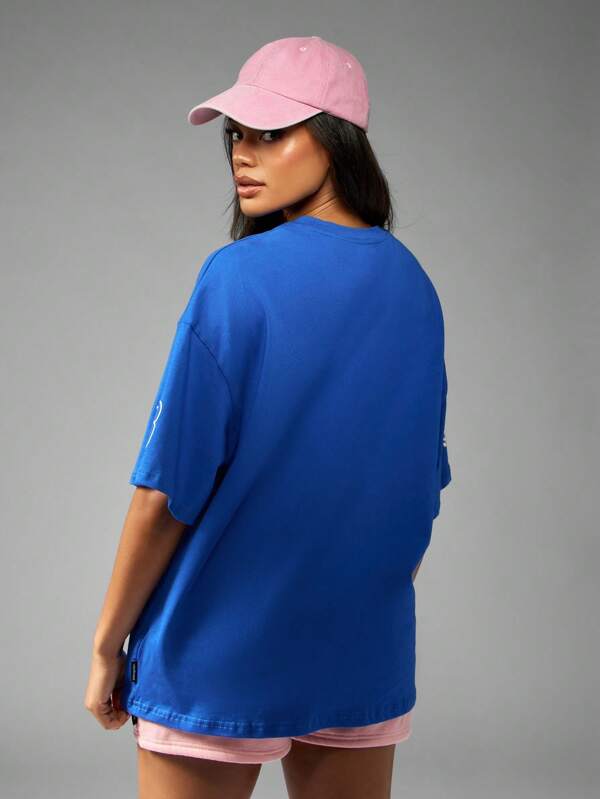 Missguided Missguided X Playboy MISSGUIDED Oversized Statement T Shirt Has Retro Racing Club Logo Printed Graphic Design