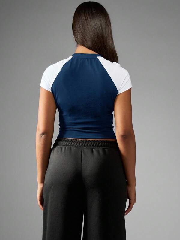 Missguided Missguided X Playboy MISSGUIDED Retro Crop Top With Raglan Sleeves And Graphic Print