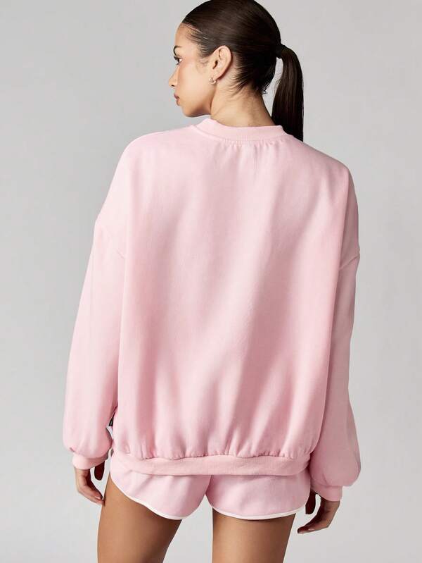 Missguided Missguided X Playboy MISSGUIDED Soft Oversized Crew Neck Sweatshirt Featuring Retro Graphics