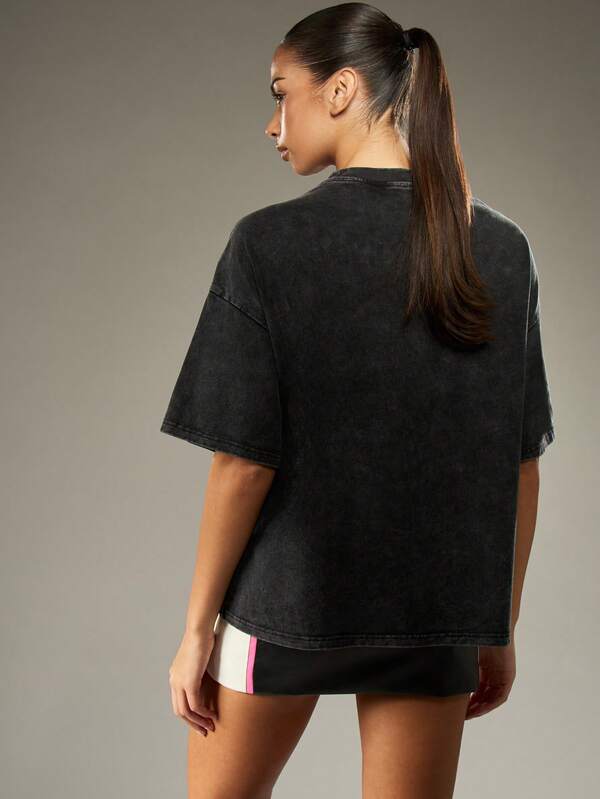Missguided Missguided X Playboy Oversized Distressed Graphic T-Shirt With Washed Effect