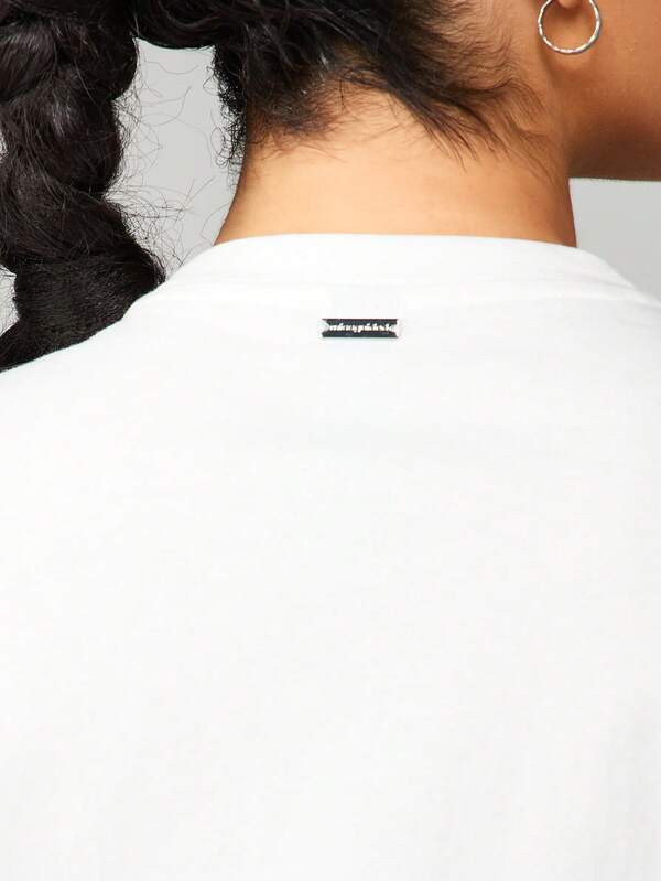 Missguided Missguided X Playboy Oversized Embossed Crew Neck T-Shirt