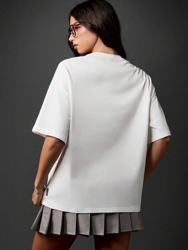 Missguided Missguided X Playboy Oversized Graphic T-Shirt With Varsity Text Print