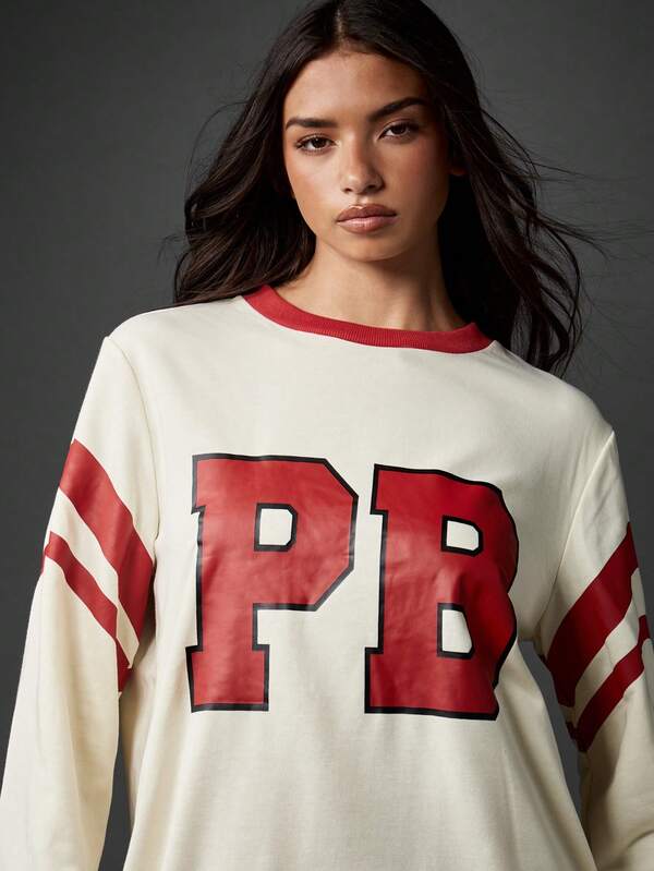 Missguided Missguided X Playboy Oversized Mini Dress With Long Sleeves And Varsity Design
